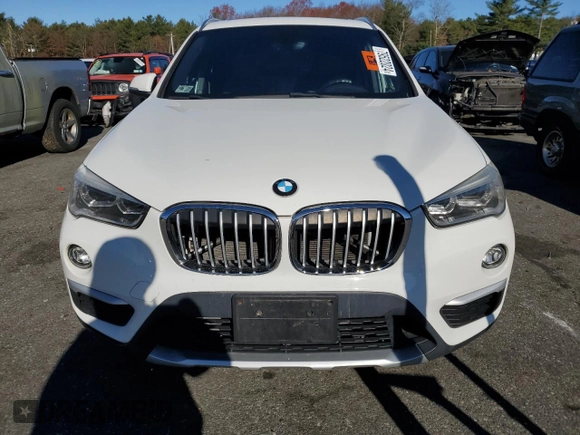 2016 BMW X1 xDrive28i with VIN WBXHT3C32G5E52052, listed as a Copart auction lot 79522024 with 76,995 mi miles and Salvage Title. Bid and sale history available at carsss.com. Image 5.
