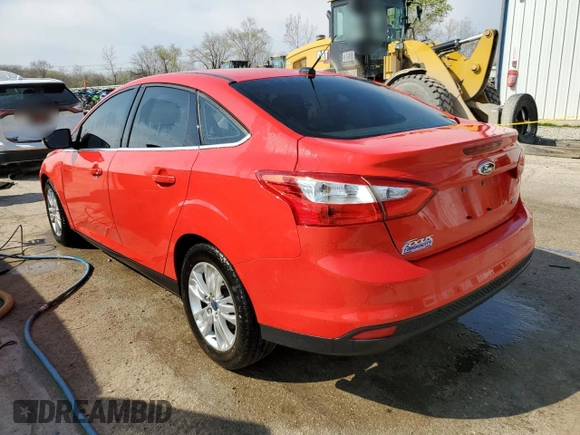 2012 Ford Focus SEL with VIN 1FAHP3H27CL405898, listed as a Copart auction lot 52615695 with 84,085 mi miles and Salvage Title. Bid and sale history available at carsss.com. Image 2.