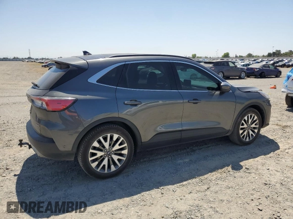 2020 Ford Escape Titanium Hybrid with VIN 1FMCU9DZ4LUA79387, listed as a Copart auction lot 62174835 with 82,486 mi miles and Salvage title. Bid and sale history available at DreamBid. Image 3.