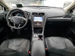 2019 Ford Fusion Hybrid Titanium with VIN 3FA6P0RU1KR222518, listed as a Copart auction lot 66924692 with 64,249 mi miles. Bid and sale history available at carsss.com. Image 8.