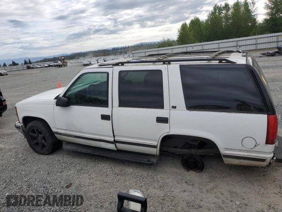 1999 Chevrolet Tahoe Z71 with VIN 1GNEK13R1XJ365475, listed as a Copart auction lot 56258175 with 184,647 mi miles and Clean Title. Bid and sale history available at DreamBid. Image 2.