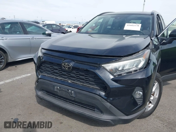 2019 Toyota RAV4 XLE with VIN JTMW1RFV7KJ011556, listed as a IAAI auction lot 41682178 with 72,795 mi miles. Bid and sale history available at carsss.com. Image 6.