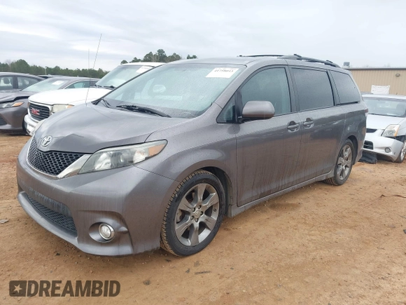 2011 Toyota Sienna SE with VIN 5TDXK3DC3BS143331, listed as a IAAI auction lot 41758043 with 215,490 mi miles. Bid and sale history available at carsss.com. Image 2.