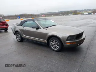 2005 Ford Mustang Deluxe with VIN 1ZVFT84N055214712, listed as a IAAI auction lot 40855851 with 98,307 mi miles. Bid and sale history available at carsss.com. Image 1.