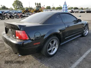 2001 Ford Mustang GT Deluxe with VIN 1FAFP42X71F163143, listed as a Copart auction lot 81133184 with 132,716 mi miles and Salvage Title. Bid and sale history available at carsss.com. Image 3.