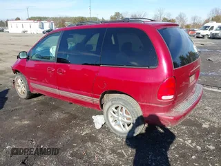 1999 Dodge Caravan z VIN 1B4GP45G7XB554879, wystawiony jako IAAI lot #41644242 z przebiegiem Nie podano mil oraz . Historia ofert i sprzedaży dostępna na DreamBid. Obrazek 3.