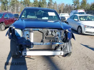 2014 Toyota Tacoma with VIN 3TMLU4EN5EM140028, listed as a IAAI auction lot 40965372 with 94,372 mi miles and . Bid and sale history available at DreamBid. Image 13.