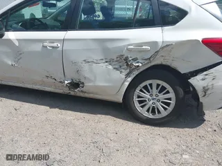 2017 Subaru Impreza Premium with VIN 4S3GTAD67H3748698, listed as a IAAI auction lot 39917558 with 56,945 mi miles. Bid and sale history available at carsss.com. Image 6.