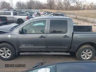 2014 Nissan Titan Pro-4X with VIN 1N6BA0EC3EN514358, listed as a IAAI auction lot 41636363 with 166,201 mi miles and . Bid and sale history available at DreamBid. Image 14.