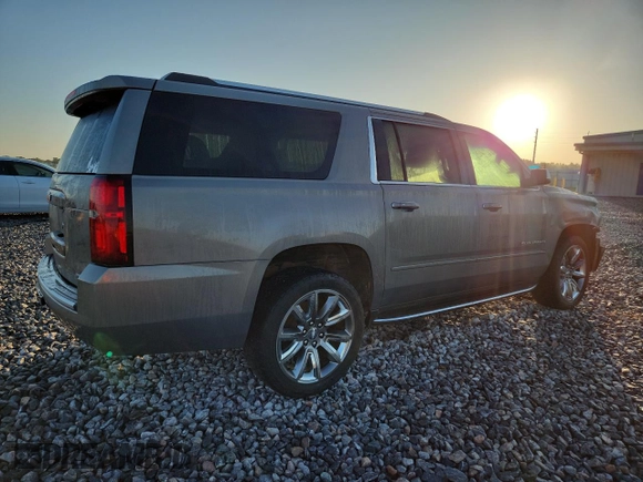 2019 Chevrolet Suburban LT with VIN 1GNSCJKC3KR129739, listed as a Copart auction lot 62377465 with 105,771 mi miles and Salvage title. Bid and sale history available at DreamBid. Image 3.