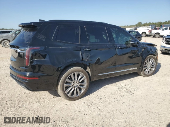 2020 Cadillac XT6 AWD Sport z VIN 1GYKPHRS2LZ172371, wystawiony jako Copart lot #50211705 z przebiegiem 59 704 mil mil oraz Szkody całkowita. Historia ofert i sprzedaży dostępna na DreamBid. Obrazek 3.