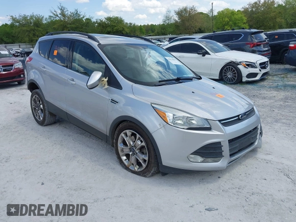 2016 Ford Escape SE with VIN 1FMCU9G92GUC28879, listed as a IAAI auction lot 42021065 with 99,184 mi miles. Bid and sale history available at carsss.com. Image 1.