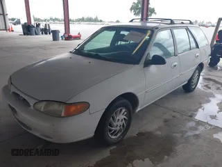 1999 Ford Escort SE with VIN 3FAFP15P3XR186800, listed as a IAAI auction lot 42125516 with 166,270 mi miles. Bid and sale history available at carsss.com. Image 2.