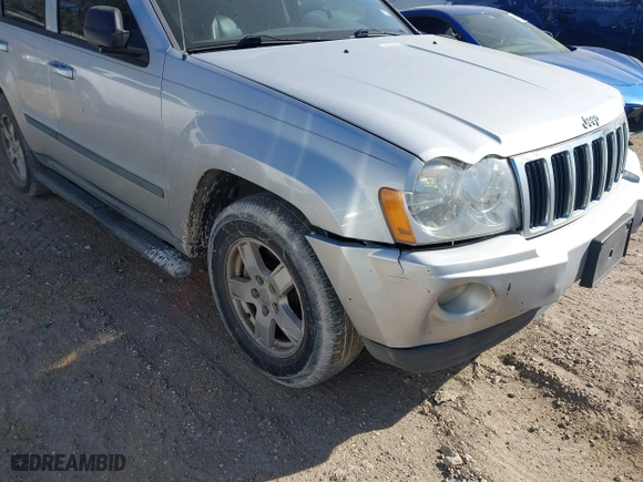 2007 Jeep Grand Cherokee Laredo with VIN 1J8HS48P77C595484, listed as a IAAI auction lot 41775290 with 176,751 mi miles. Bid and sale history available at carsss.com. Image 6.