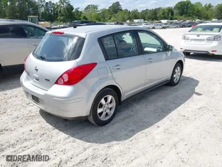 2012 Nissan Versa S with VIN 3N1BC1CP2CK278929, listed as a IAAI auction lot 42080650 with 169,609 mi miles. Bid and sale history available at carsss.com. Image 4.