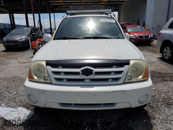 2004 Suzuki XL7 LX with VIN JS3TX92V444107106, listed as a Copart auction lot 62322035 with 94,380 mi miles and Salvage title. Bid and sale history available at DreamBid. Image 5.
