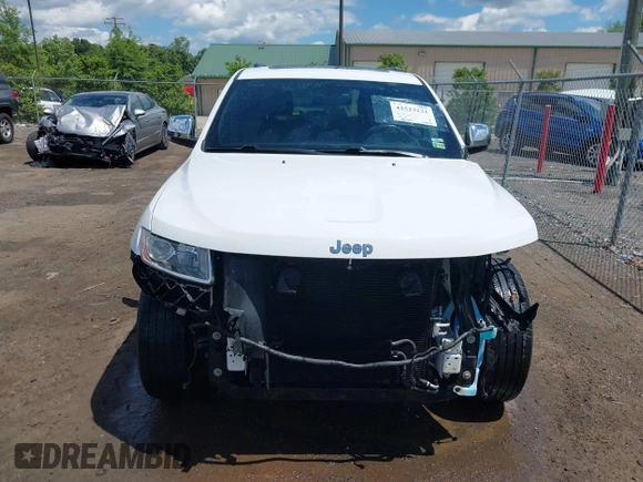 2014 Jeep Grand Cherokee Limited with VIN 1C4RJFBG3EC350648, listed as a IAAI auction lot 42523221 with 125,447 mi miles and . Bid and sale history available at DreamBid. Image 6.