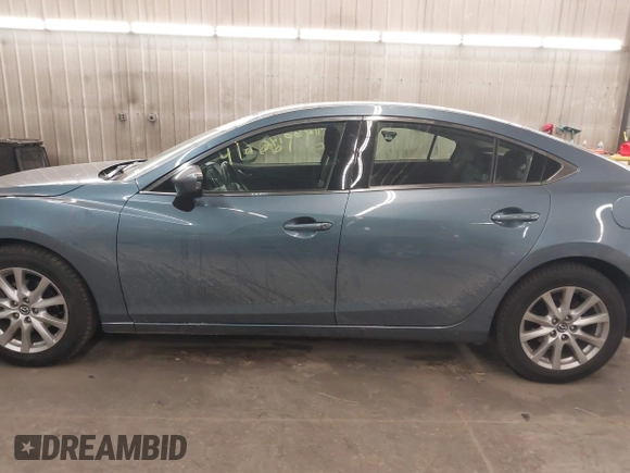 2015 Mazda 6 i Sport with VIN JM1GJ1U65F1170793, listed as a IAAI auction lot 41266146 with 125,701 mi miles and . Bid and sale history available at carsss.com. Image 15.