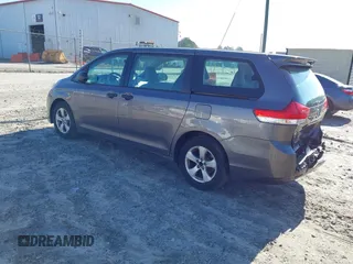 2014 Toyota Sienna L with VIN 5TDZK3DC3ES506658, listed as a IAAI auction lot 41469391 with 169,848 mi miles. Bid and sale history available at carsss.com. Image 3.