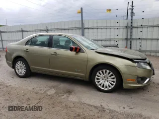 2012 Ford Fusion Hybrid с VIN 3FADP0L33CR218348, выставлен на аукционе Copart как лот 57134285 с пробегом 165 818 миль миль и Списание • Salvage title. История ставок и продаж доступна на DreamBid. Изображение 4.