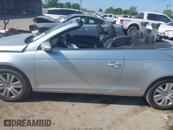 2009 Volkswagen Eos Komfort with VIN WVWBA71F39V020521, listed as a IAAI auction lot 42004648 with 50,885 mi miles and . Bid and sale history available at DreamBid. Image 14.