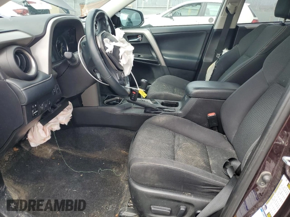 2018 Toyota RAV4 XLE with VIN 2T3RFREV2JW841670, listed as a Copart auction lot 50700675 with Not Provided miles and Salvage Title. Bid and sale history available at DreamBid. Image 7.