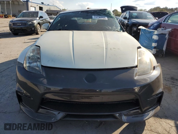 2004 Nissan 350Z Enthusiast with VIN JN1AZ34D84M104374, listed as a Copart auction lot 74736994 with 116,098 mi miles and Salvage Title. Bid and sale history available at DreamBid. Image 5.