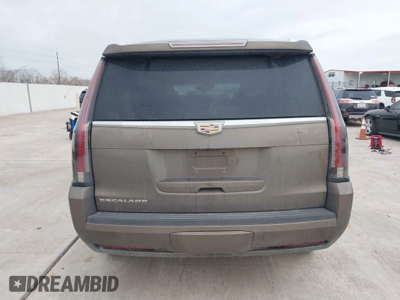2015 Cadillac Escalade Luxury z VIN 1GYS3MKJ9FR725818, wystawiony jako IAAI lot #41596731 z przebiegiem 224 246 mil mil oraz . Historia ofert i sprzedaży dostępna na DreamBid. Obrazek 16.