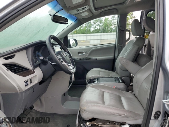 2015 Toyota Sienna XLE с VIN 5TDYK3DC7FS571431, выставлен на аукционе Copart как лот 57173595 с пробегом 305 940 миль миль и Списание • Salvage title. История ставок и продаж доступна на DreamBid. Изображение 7.
