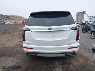 2023 Cadillac XT6 AWD Sport with VIN 1GYKPHRS1PZ155437, listed as a IAAI auction lot 41758495 with 22,949 mi miles. Bid and sale history available at carsss.com. Image 16.