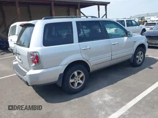 2006 Honda Pilot EX with VIN 2HKYF18446H000383, listed as a IAAI auction lot 42129875 with 206,723 mi miles and . Bid and sale history available at DreamBid. Image 4.