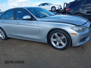 2013 BMW 3 Series 328i with VIN WBA3C1C52DF440786, listed as a IAAI auction lot 40777716 with 171,385 mi miles. Bid and sale history available at carsss.com. Image 6.