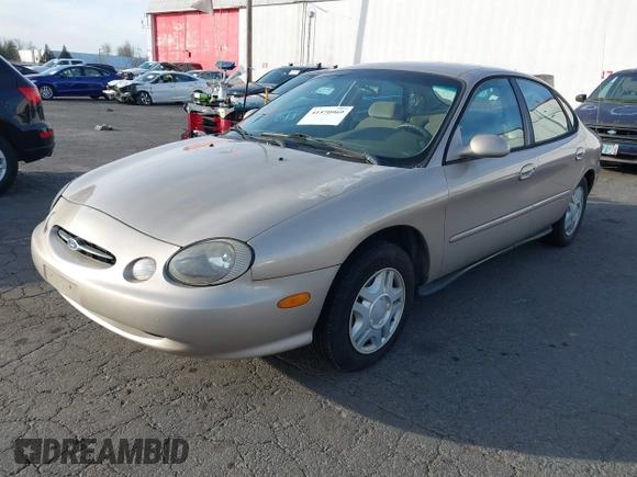 1999 Ford Taurus SE with VIN 1FAFP53U4XG223246, listed as a IAAI auction lot 41570969 with 59,064 mi miles. Bid and sale history available at carsss.com. Image 2.