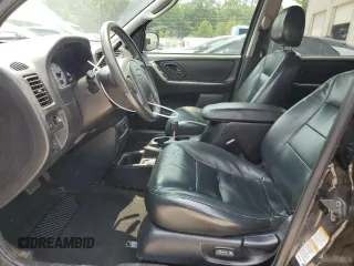 2004 Ford Escape Limited with VIN 1FMCU04164KB51256, listed as a Copart auction lot 58969565 with 137,360 mi miles and Salvage title. Bid and sale history available at DreamBid. Image 7.