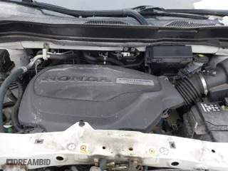 2019 Honda Ridgeline RTL-E with VIN 5FPYK3F77KB007879, listed as a IAAI auction lot 41697569 with 80,215 mi miles. Bid and sale history available at carsss.com. Image 10.