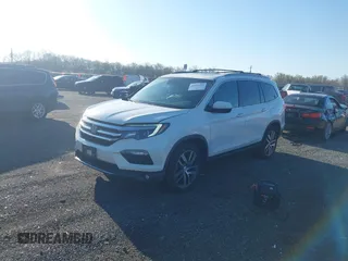 2017 Honda Pilot Elite with VIN 5FNYF6H00HB032386, listed as a IAAI auction lot 41976702 with 153,251 mi miles and . Bid and sale history available at DreamBid. Image 2.