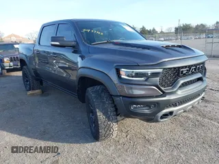 2022 Ram 1500 TRX with VIN 1C6SRFU99NN144769, listed as a IAAI auction lot 40937963 with 20,125 mi miles. Bid and sale history available at carsss.com. Image 1.