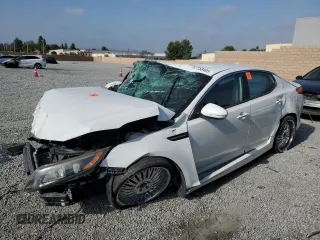 2014 Kia Optima SX with VIN 5XXGR4A77EG310630, listed as a Copart auction lot 57258405 with 100,191 mi miles and Salvage title. Bid and sale history available at DreamBid. Image 1.