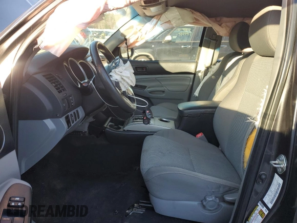 2015 Toyota Tacoma PreRunner with VIN 3TMKU4HN2FM043748, listed as a Copart auction lot 88764915 with 160,731 mi miles and Salvage title. Bid and sale history available at DreamBid. Image 7.