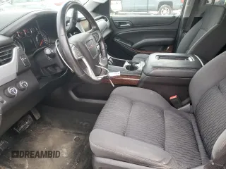 2015 GMC Yukon SLE with VIN 1GKS2AKCXFR107100, listed as a Copart auction lot 47050165 with 135,345 mi miles and Clean Title. Bid and sale history available at carsss.com. Image 7.