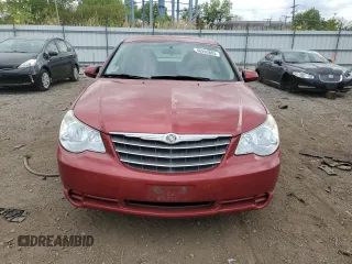 2010 Chrysler Sebring Limited z VIN 1C3CC5FB4AN208787, wystawiony jako Copart lot #56593865 z przebiegiem 96 496 mil mil oraz Szkody całkowita. Historia ofert i sprzedaży dostępna na DreamBid. Obrazek 5.