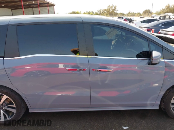 2024 Honda Odyssey Touring with VIN 5FNRL6H82RB027601, listed as a IAAI auction lot 41808680 with 25,911 mi miles and . Bid and sale history available at DreamBid. Image 13.