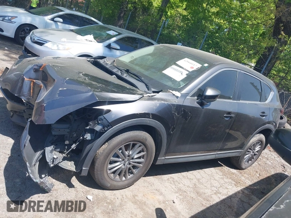 2017 Mazda CX-5 Touring with VIN JM3KFACL5H0197432, listed as a IAAI auction lot 42060117 with 1 mi miles. Bid and sale history available at carsss.com. Image 14.