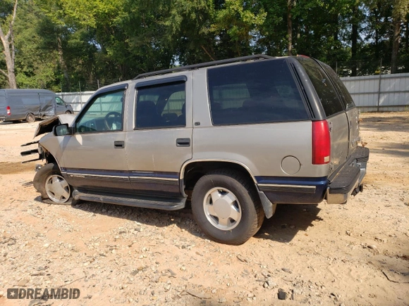 1999 Chevrolet Tahoe Z71 with VIN 1GNEK13R1XJ315188, listed as a Copart auction lot 68498944 with 264,880 mi miles and Salvage Title. Bid and sale history available at carsss.com. Image 2.