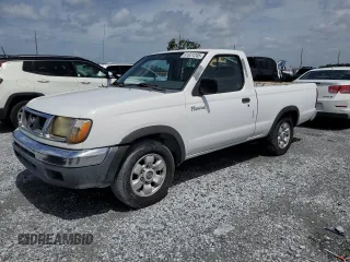 1998 Nissan Frontier XE z VIN 1N6DD21S5WC335549, wystawiony jako Copart lot #61021245 z przebiegiem 310 230 mil mil oraz Czysty tytuł • Clean title. Historia ofert i sprzedaży dostępna na DreamBid. Obrazek 1.