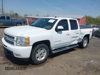 2013 Chevrolet Silverado 1500 LTZ with VIN 3GCPKTE24DG123063, listed as a IAAI auction lot 42061675 with 221,813 mi miles and . Bid and sale history available at DreamBid. Image 18.