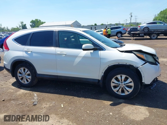 2012 Honda CR-V EX-L with VIN 5J6RM4H76CL069650, listed as a IAAI auction lot 42640309 with 223,747 mi miles and . Bid and sale history available at DreamBid. Image 13.
