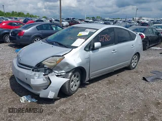 2007 Toyota Prius z VIN JTDKB20U677677900, wystawiony jako IAAI lot #42176780 z przebiegiem 246 442 mil mil oraz . Historia ofert i sprzedaży dostępna na DreamBid. Obrazek 2.