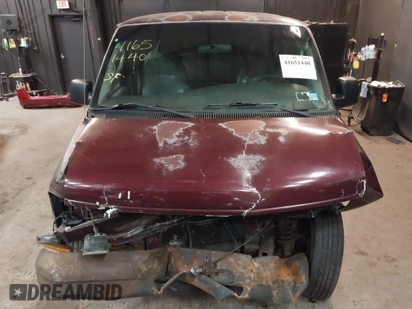 2004 Ford Econoline Cargo with VIN 1FTRE14WX4HA29431, listed as a IAAI auction lot 41651440 with 247,750 mi miles. Bid and sale history available at carsss.com. Image 6.