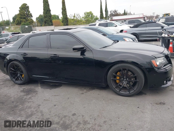 2013 Chrysler 300 SRT-8 with VIN 2C3CCAFJ9DH576184, listed as a IAAI auction lot 42162364 with 104,021 mi miles and . Bid and sale history available at carsss.com. Image 14.